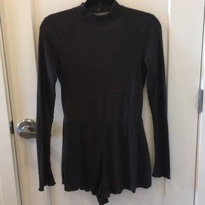 Open back turtleneck romper from Urban Outfitters